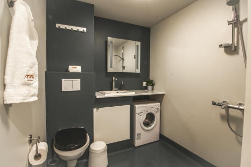 Koupelna v ubytování Spot Apartments Uusmäki