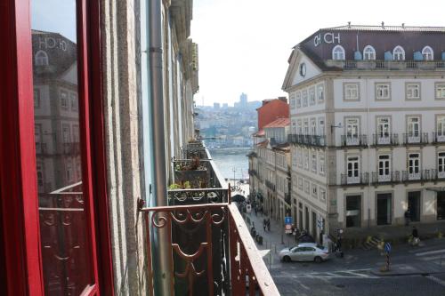 a view of a city street from a window at Santo da Casa / Sc apartments in Porto