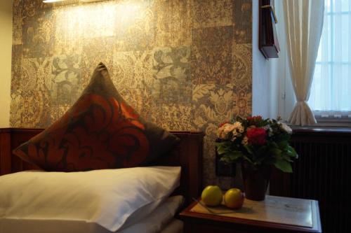 Postelja oz. postelje v sobi nastanitve Boutiquehotel Oberkirch im Zentrum