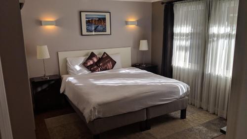 MacLean Guest Houseにあるベッド