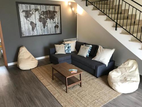 a living room with a couch and a table at ProKite Alby Rondina - RESORT - in Birgi Vecchi