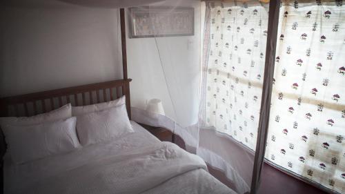 Cama o camas de una habitación en Patnem Dwarka