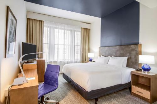 Ένα ή περισσότερα κρεβάτια σε δωμάτιο στο New Bedford Harbor Hotel, Ascend Hotel Collection
