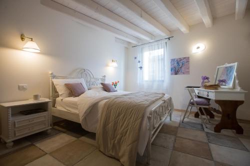 מיטה או מיטות בחדר ב-EDERA dei Guatto