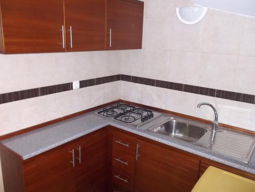 Η κουζίνα ή μικρή κουζίνα στο Basic Hotel