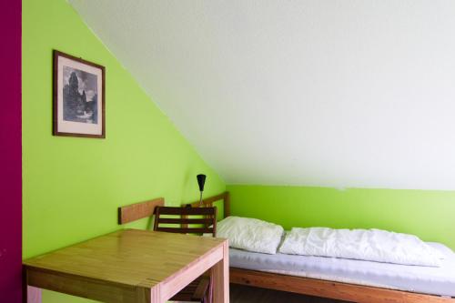 Postel nebo postele na pokoji v ubytování Labyrinth Hostel Weimar