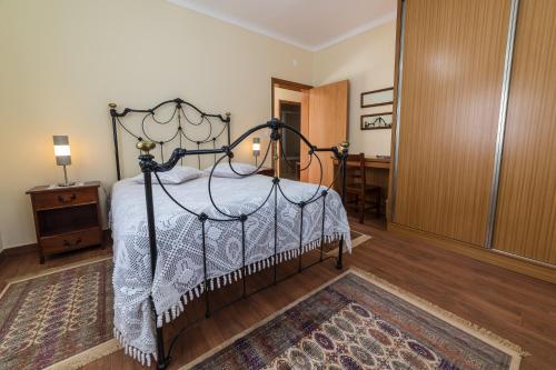 Katil atau katil-katil dalam bilik di Quinta do Oeste