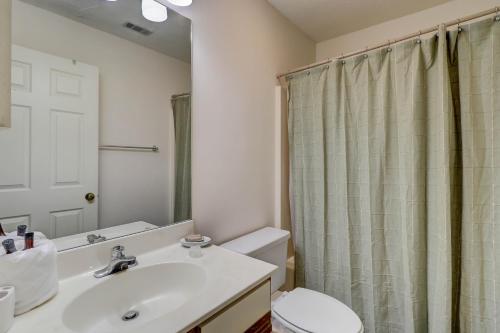 a bathroom with a sink and a toilet and a shower at Ocean Breeze in Hilton Head Island