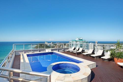 a swimming pool on the deck of a cruise ship at Points North Apartments in Gold Coast