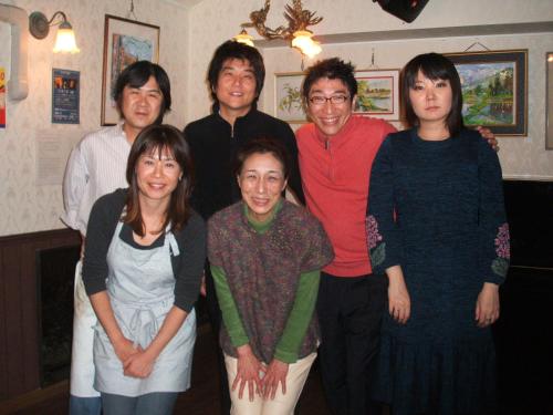 a group of people posing for a picture at Live Cafe Hisui no Umi in Itoigawa
