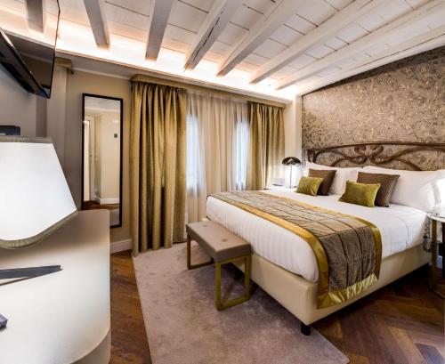 Postel nebo postele na pokoji v ubytování BW Premier Collection CHC Continental