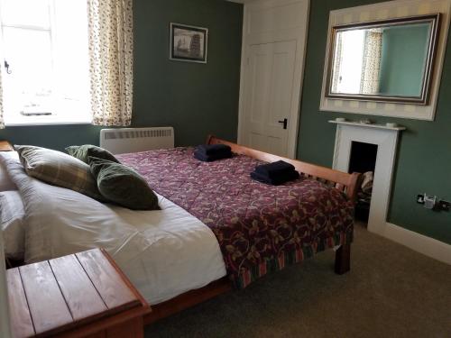 Ένα ή περισσότερα κρεβάτια σε δωμάτιο στο JJ's "Gin Palace" luxury riverside town house