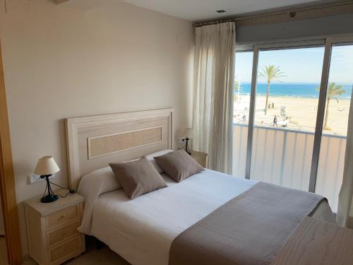 Cama o camas de una habitación en BEACH I
