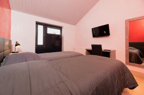 Μια τηλεόραση ή/και κέντρο ψυχαγωγίας στο Motel D'ornex