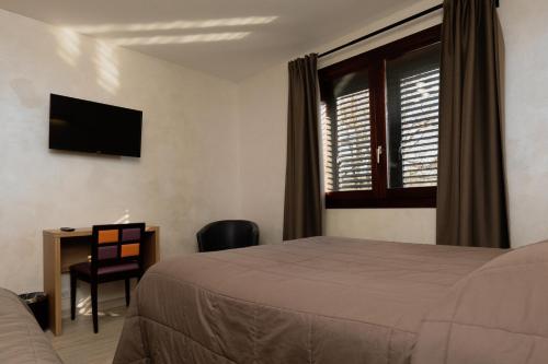Μια τηλεόραση ή/και κέντρο ψυχαγωγίας στο Motel D'ornex