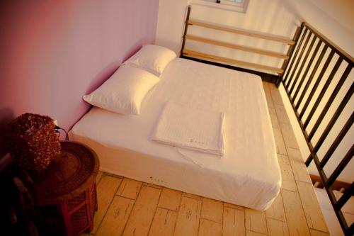 Cama o camas de una habitación en Alongs Garden