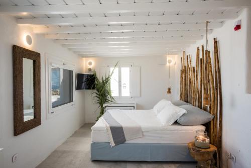 Ліжко або ліжка в номері 9 Islands Suites Mykonos