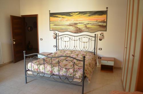 Una cama o camas en una habitación de Al Pasarat