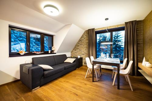 Χώρος καθιστικού στο Apartmány Adélka Špindlerův Mlýn