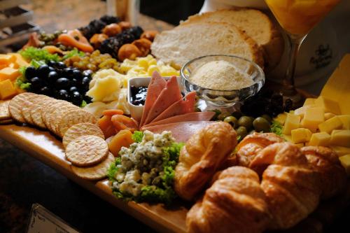 a platter of different types of food on a table at bai Hotel Cebu in Cebu City