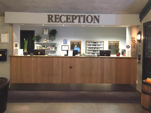 a reception area of a hospital with a reception counter at STF Zinkensdamm Hostel in Stockholm