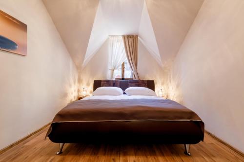 Postel nebo postele na pokoji v ubytování Apartments Menuet