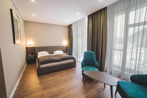 Hotel Irys by Derenivska Kupilにあるベッド