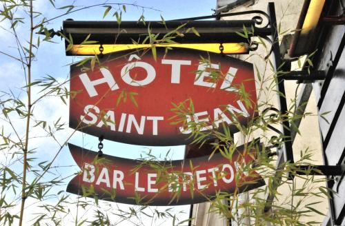 a sign on the side of a building at Hôtel Saint Jean in Tours