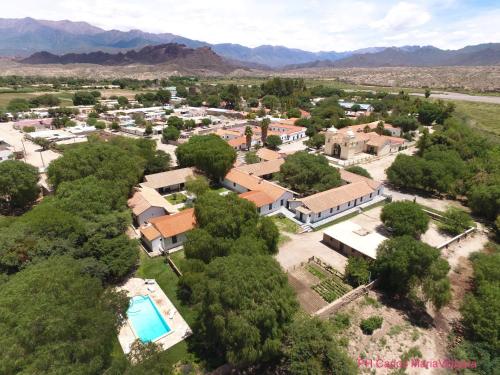 an aerial view of a small town with trees and buildings at Hacienda de Molinos Hotel in Molinos