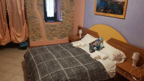 Кровать или кровати в номере Locanda Dalla Compagnia
