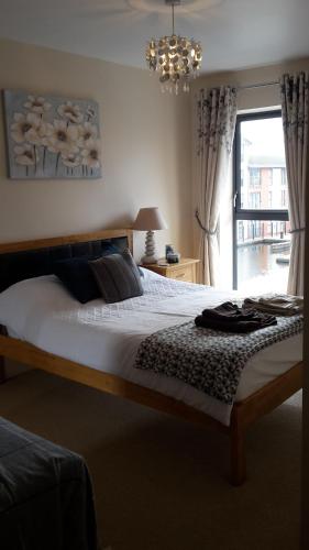Ένα ή περισσότερα κρεβάτια σε δωμάτιο στο River view Apartment