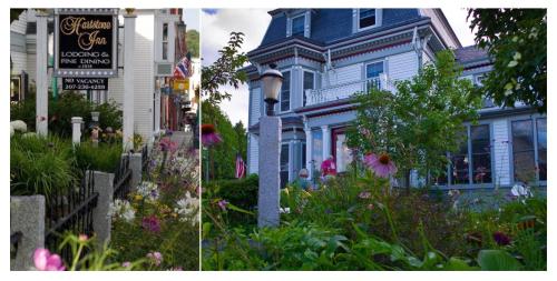 a house with a flower garden in front of it at Hartstone Inn & Hideaway in Camden