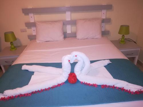 Costarena Beach Hotelにあるベッド