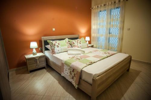 En eller flere senge i et værelse på La Casa Di Linda