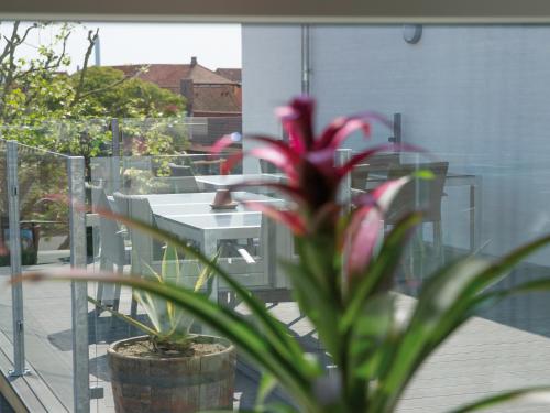 Un balcón o terraza en Rønne Hotel