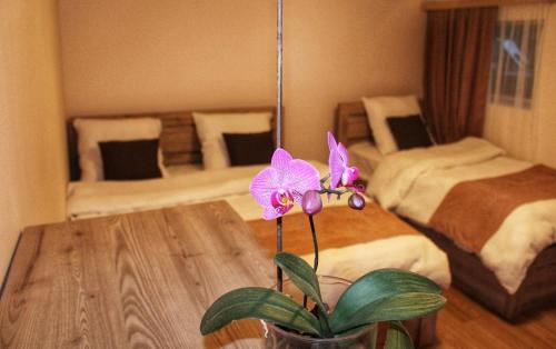 Giường trong phòng chung tại Rooms 3