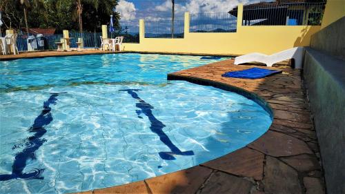 A piscina localizada em Hotel Fazenda Estância São Domingos ou nos arredores