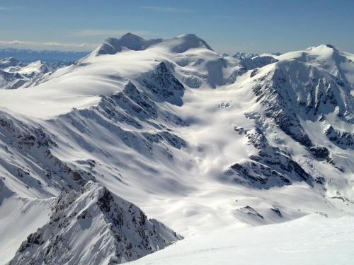 a mountain covered in snow with at Rifugio Ghiacciaio dei Forni in Valfurva
