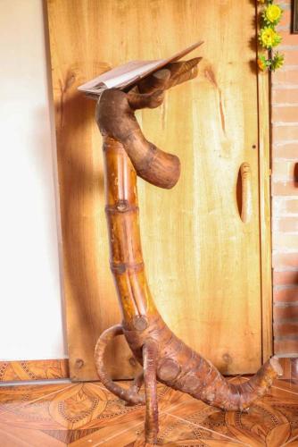 a wooden lamp with a book on top of it at Chalet Ecoturismo La Nohelia in Jericó