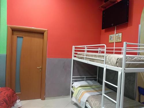 Katil atau katil-katil dalam bilik di Lorenzo B&B