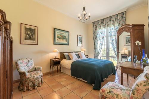 Postel nebo postele na pokoji v ubytování Hacienda las tres niñas