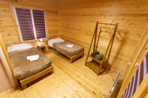 Llit o llits en una habitació de Cottage Shgedi