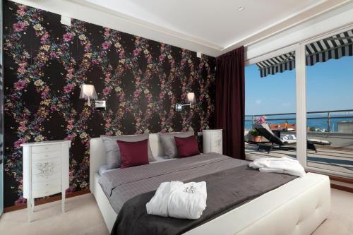 Posteľ alebo postele v izbe v ubytovaní Boban Luxury Suites