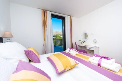 Posteľ alebo postele v izbe v ubytovaní Dubrovnik oasis
