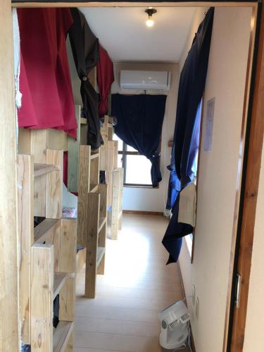 Ένα ή περισσότερα κρεβάτια σε δωμάτιο στο Guesthouse Asibina