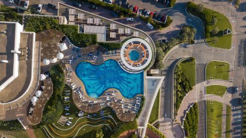 an overhead view of a pool at a resort at Enjoy Punta del Este in Punta del Este
