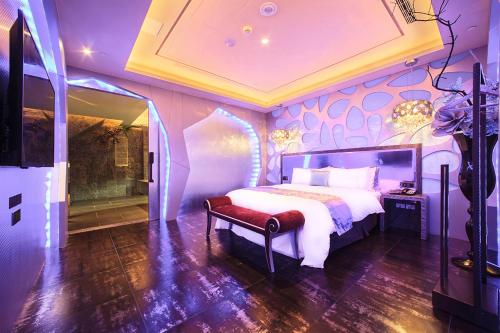 Ein Bett oder Betten in einem Zimmer der Unterkunft Norwegian Forest Leisure Motel