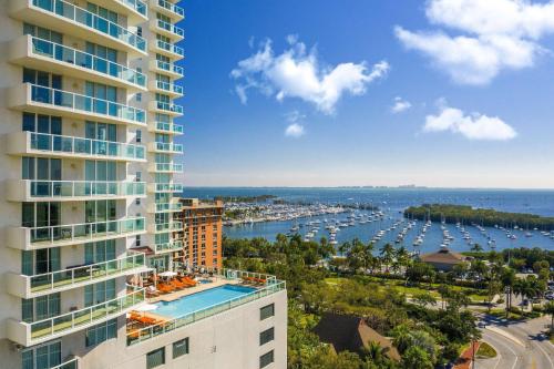 an aerial view of a building and a harbor at Hotel Arya BW Premier Collection in Miami