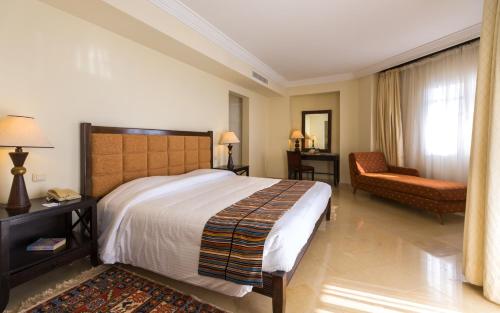 A bed or beds in a room at Medina Solaria And Thalasso