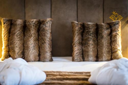 En eller flere senge i et værelse på Hôtel Daria-I Nor by Les Etincelles